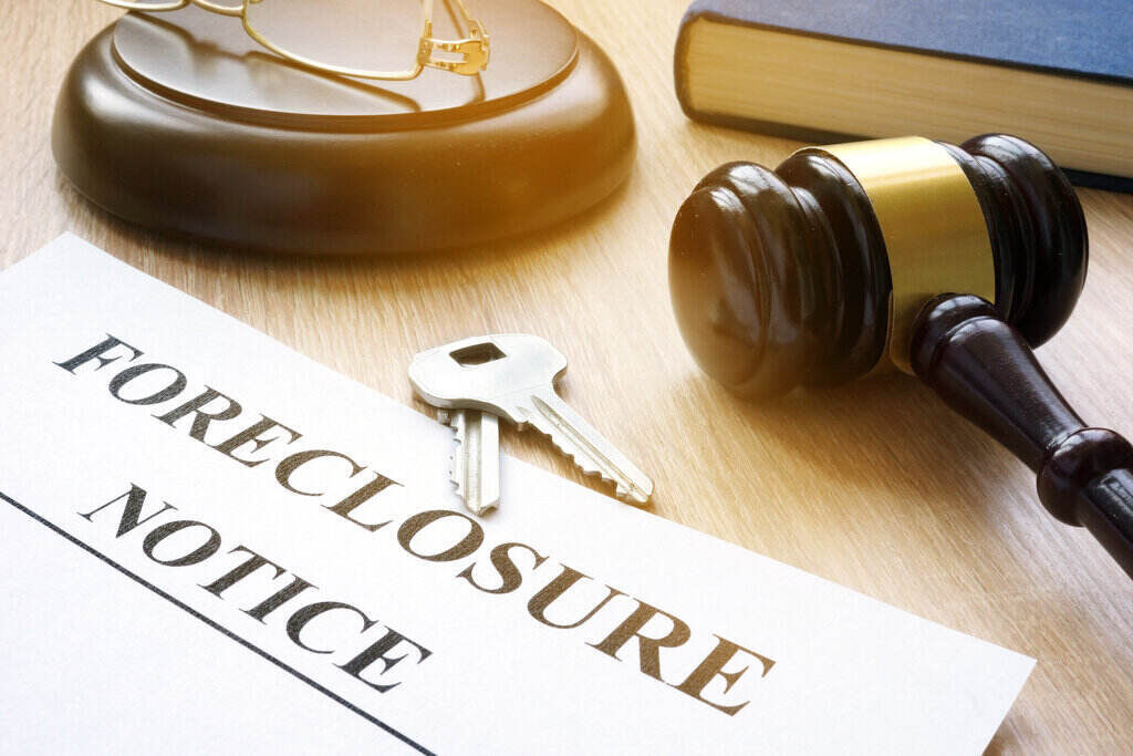 Foreclosure notice, keys, and gavel